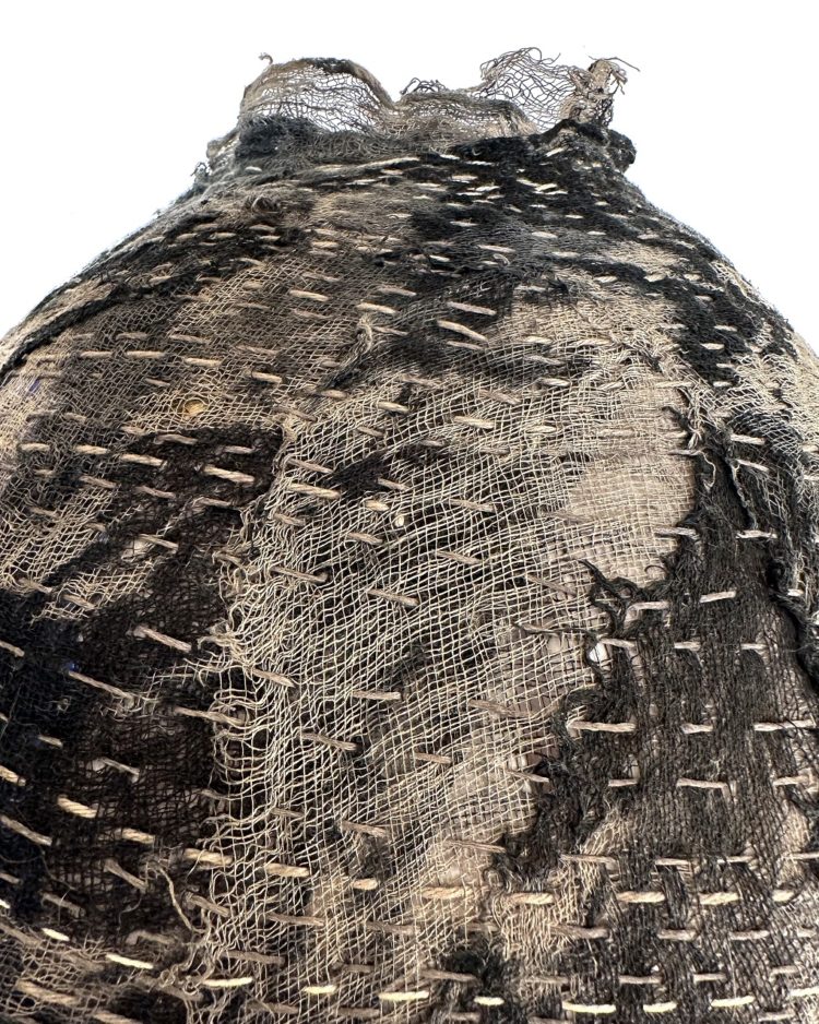 Ross Belton, Ukhamba Gauze Bowl (detail), 2022. 35cm x 30cm (14” x 12”). Iron-contact printing, natural dye and hand stitch. Cotton scrim, cotton thread and logwood dye. Photo: Jonathan Dredge